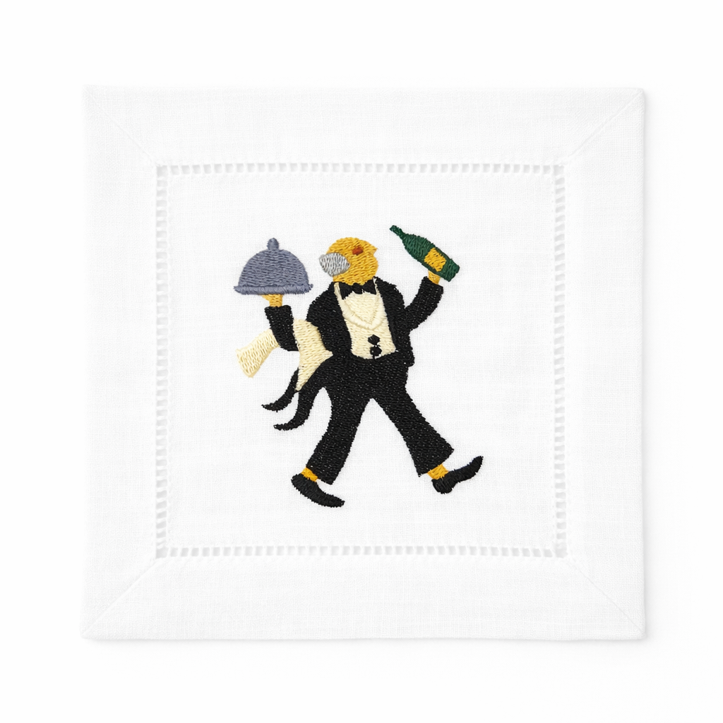 White embroidered cocktail napkin with a classic waiter illustration, ideal for cocktail parties and hostess gifts.