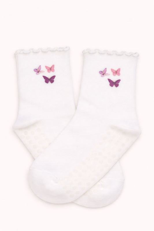 White embroidered butterfly Pilates grip socks featuring pink and purple butterfly designs, non-slip soles, ruffled ankle detail, and breathable fabric, ideal for Pilates, barre, yoga, and studio workouts.