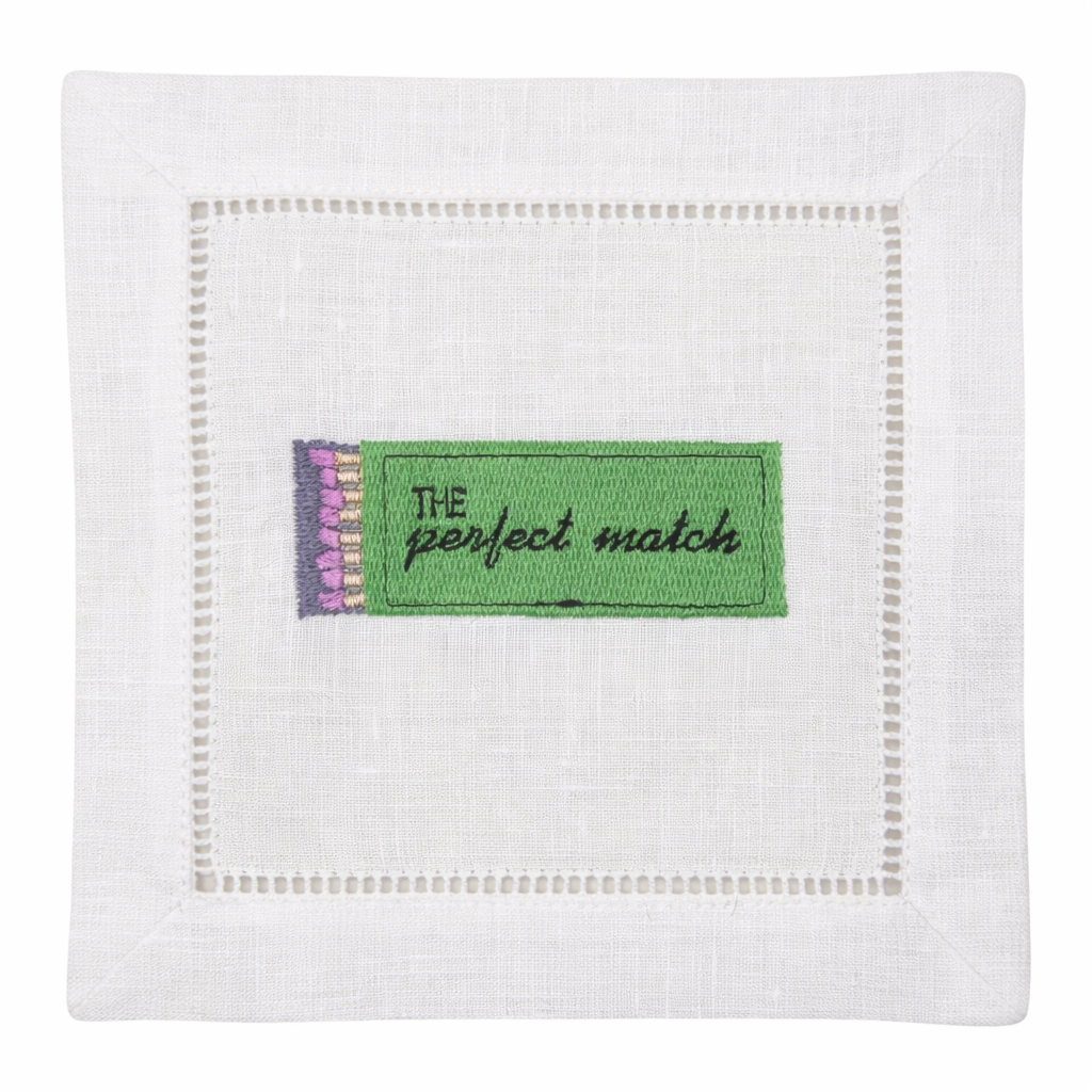 White embroidered cocktail napkin featuring “The Perfect Match,” luxury linen napkin for weddings, hosting, and gifts.