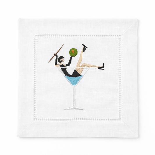 White embroidered cocktail napkin with martini illustration, ideal for bar carts, hosting, and hostess gifts